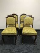 Four oak dining chairs