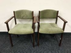 Six stained beech armchairs upholstered in green dralon