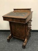 A Victorian rosewood davenport