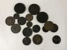 A tin of British coins inc.