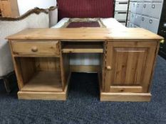 A pine twin pedestal PC desk