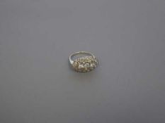 A Victorian oval shaped diamond cluster ring, 4.1g, size I.