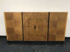 An oak Art Deco triple door sideboard