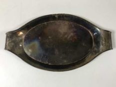 A sterling silver twin handled dish,