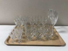 A tray containing assorted lead crystal drinking glasses including a pair of Edinburgh crystal