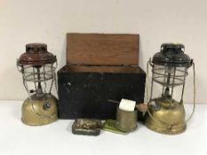 A pine box of hand tools, wire brushes, oil lamp fittings,