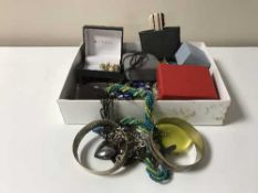 A box containing assorted costume jewellery