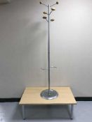 A contemporary office coffee table and a hat & coat stand