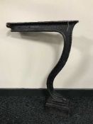 A pair of antique cast metal table supports