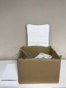 A box of Nintendo Wii with accessories,