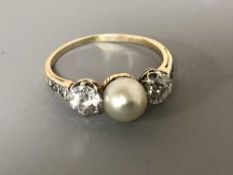 An early 18ct gold pearl and diamond ring