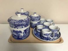 A tray of six pieces of Spode blue and white china, three lidded storage jars,