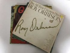 A box of LP records - Roy Orbison, The Police,