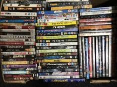 A stand of assorted DVDs and CDs,