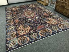 An impressive Persian carpet on blue ground