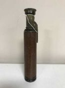 A brass and leather telescope