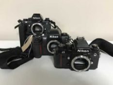 A Nikon F3 camera with motor drive,