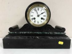A Victorian slate and marble mantel clock