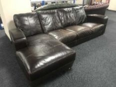 A brown leather corner settee