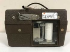 A Benzing Quartz automatic timing clock with key