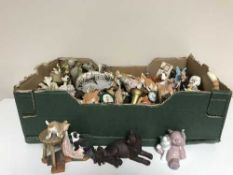 A box of assorted cat ornaments and figures inc.
