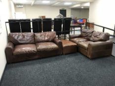 Two brown leather settees and a brown leather footstool (odd)