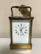 A French brass carriage clock with key