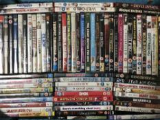 Three boxes of assorted DVDs