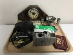 A tray of collectables including a ship-style cruet set, legs nutcrackers, pewter hip flask,