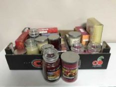 A box of Yankee Candles