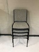 Eleven stacking chairs in grey fabric