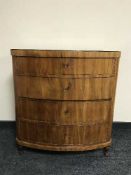 A continental mahogany bow-fronted chest of four drawers