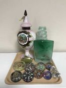 A tray of antique hand painted lidded vase, two glass vases, eight glass paperweights,
