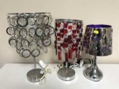 Nine contemporary table lamps together with two shades