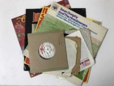 Two boxes containing assorted LP's, 45's and CD's including Elvis,