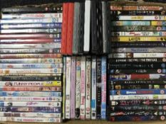 Three boxes of assorted DVDs