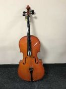 A cello with bow in carry case by Chremona