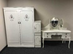 A four piece painted white and gilt bedroom suite - double wardrobe, dressing table,