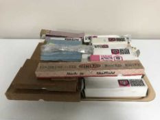 A tray of boxed stainless steel table cutlery by Viners, Onida,