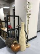 A metal standard lamp with glass shades, metal plant holder, penny farthing,