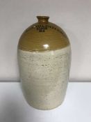 A large stone storage jar - A. Campbell.