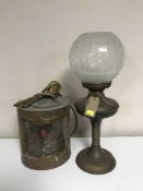 A copper meteorite ship's lamp and a copper oil lamp with glass shade