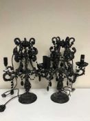 Three black table lamps with drops