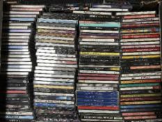 Four boxes of assorted CDs