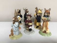 Eight Royal Doulton Bunnykins figures including lawyer, policeman,