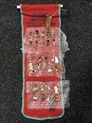 Thirty two Golly pin badges