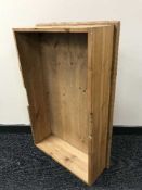 A pair of pine under-bed storage drawers