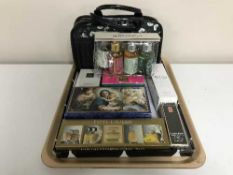 A tray of assorted beauty products by Estee Lauder, Elizabeth Arden,