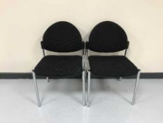 Fifteen Verco office stacking chairs in black fabric