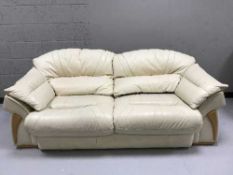 Cream leather two seater and three seater settees